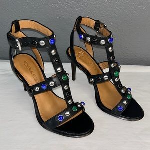 New black leather COACH sandals with black, royal blue, green and metal stones